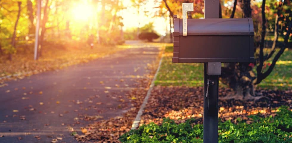 Mailbox on quiet neighborhood street.